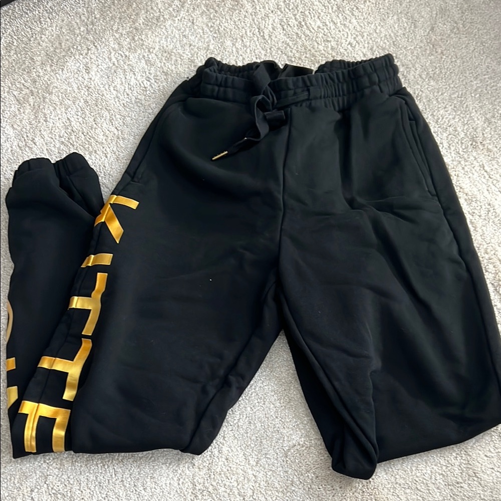 Women’s Black Joggers with Gold Accents